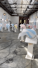 Art exhibition documented at industrial venue in Paris