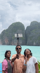 Chinese elderly tour group visits Ao Nang beach Thailand