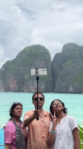 Chinese elderly tour group visits Ao Nang beach Thailand