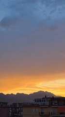 Sunset recorded over Salerno cityscape and mountains