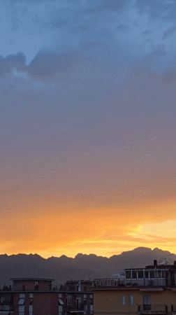 Sunset recorded over Salerno cityscape and mountains