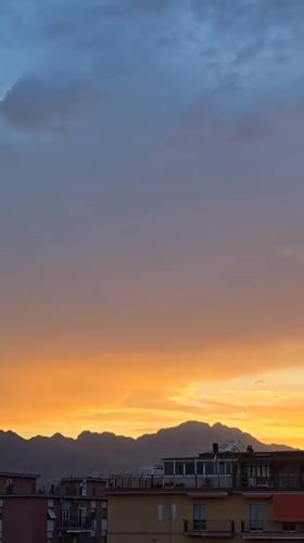 Sunset recorded over Salerno cityscape and mountains