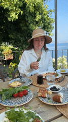 Seaside Turkish breakfast in Fethiye with a sleeping dog nearby