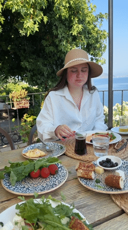 Seaside Turkish breakfast in Fethiye with a sleeping dog nearby