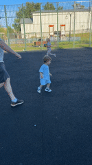 Summer afternoon at a Klin sports court, kids playing outside