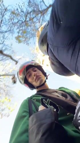 Motorcyclists navigate residential Buenos Aires neighborhood streets