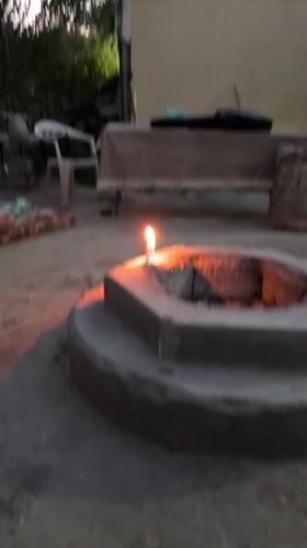 Lazy afternoon at an outdoor fire pit spot in Leh