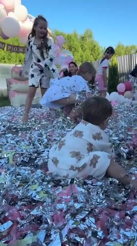 Children's birthday party celebration in Kazan backyard with confetti