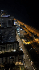 Batumi's nighttime skyline and spiral tower from above