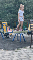 Afternoon at a Sochi park: playground activity and riverside views
