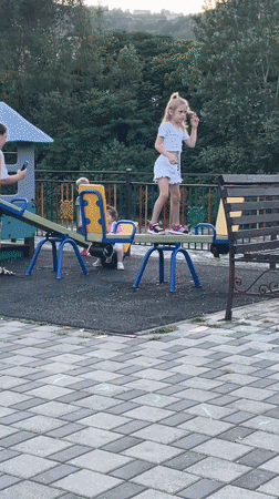 Afternoon at a Sochi park: playground activity and riverside views