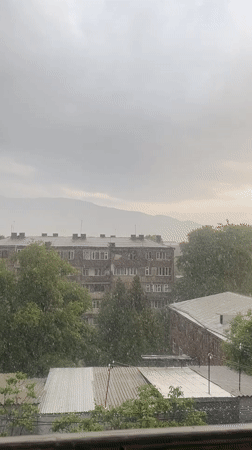 Heavy rainstorm rolls through Gladzor on a July afternoon