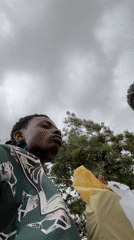 Two young men photographed outside in Bukuru, Nigeria