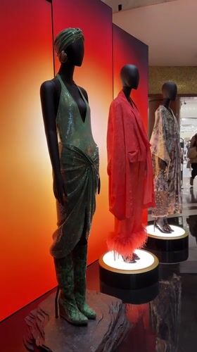 Fashion displays and retail scenes documented across Milan
