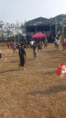 Public celebration with stage and market tents in Kediri City