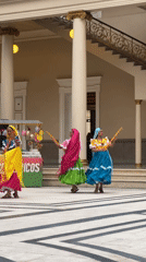 Women perform Nicaraguan folk dance in San Salvador courtyard