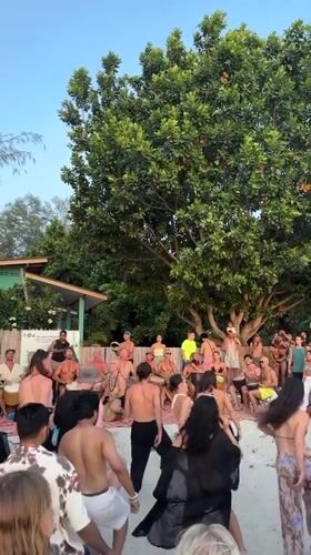 Beach drum circle draws diverse crowd in Thailand