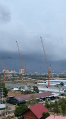 Morning scenes in Pattaya: storm clouds, construction, birthday flowers