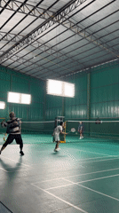 Indoor badminton matches played at Thai sports facility
