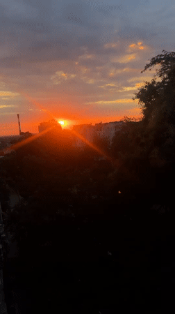 Belgrade sunset with dramatic orange light and lens flare