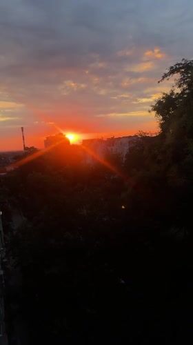 Belgrade sunset with dramatic orange light and lens flare