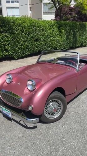 Pink vintage convertible spotted on Surrey street