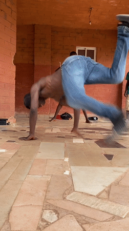 Young men perform breakdancing, group routines in Kuru Karama