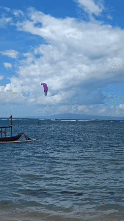 Traditional outrigger boats spotted in calm Denpasar waters
