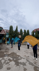 School students rehearse flags and melodicas in Lhokseumawe