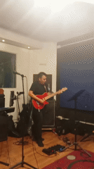 Musicians rehearse in Santiago studio late night session