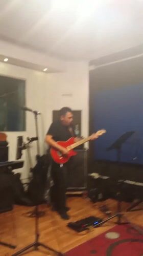 Musicians rehearse in Santiago studio late night session