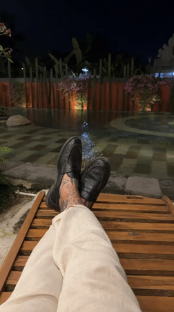 Visitor documents afternoon at Ubud resort with pools and gardens
