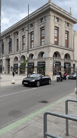 Electric scooter rider documented in central Budapest street scenes