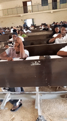 Students take exam in Akwanga classroom