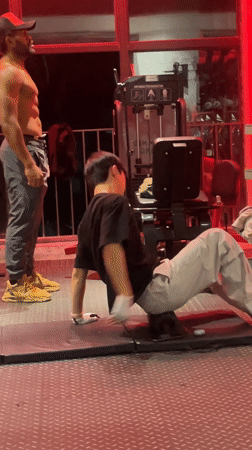 Person performs back exercises in Chongqing gym