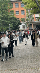 College students attend classes, walk campus in Shanghai