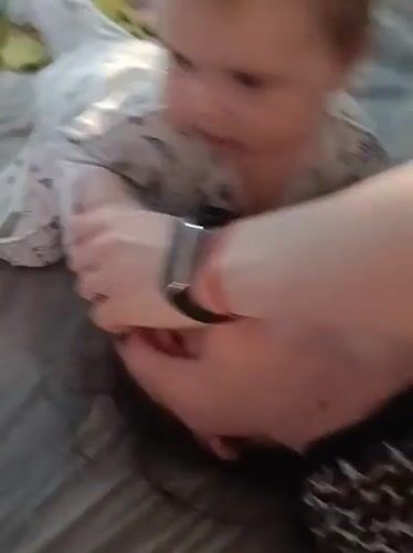 Mother and baby playtime recorded in Rusalevka home