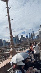 Brooklyn Bridge pedestrian walkway on a cloudy evening