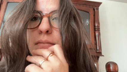 Portrait and flowering houseplant documented in Puebla, Mexico