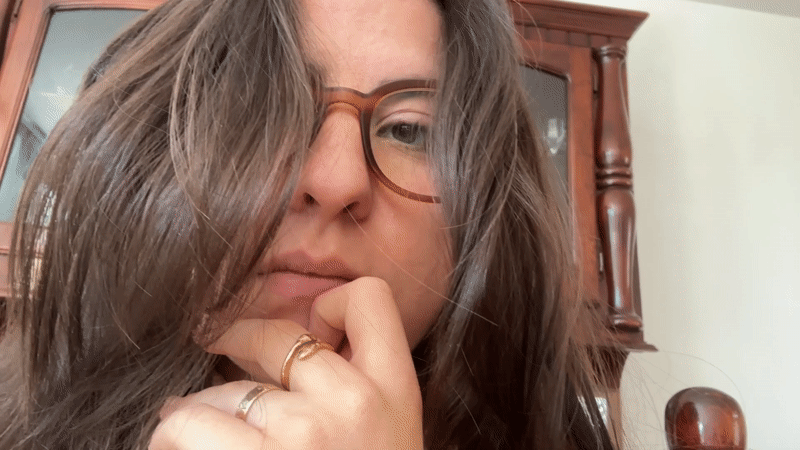 Portrait and flowering houseplant documented in Puebla, Mexico