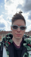 Person films selfie content in Vilnius town square
