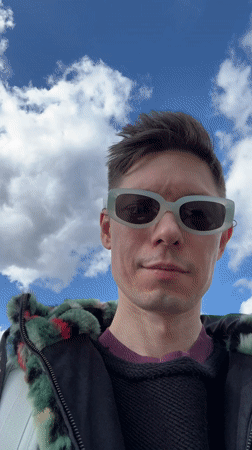 Person films selfie content in Vilnius town square