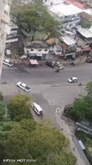 Aerial footage captures busy Caracas street corner traffic