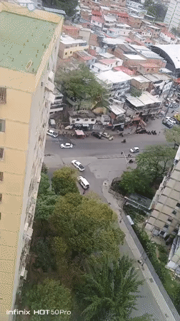 Aerial footage captures busy Caracas street corner traffic