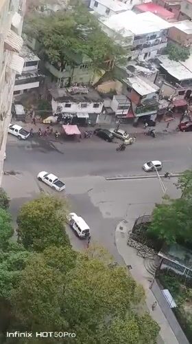 Aerial footage captures busy Caracas street corner traffic