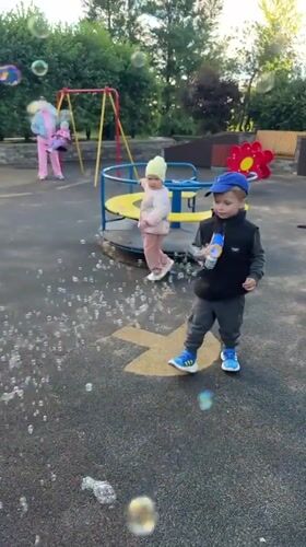 Afternoon playtime at a Moscow neighborhood playground.