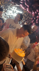 Birthday celebration observed in Canggu, Indonesia with cake and guests