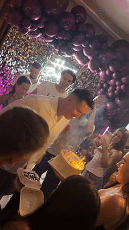 Birthday celebration observed in Canggu, Indonesia with cake and guests