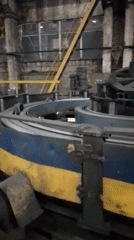 Industrial facility operates metal-cutting machinery during evening shift
