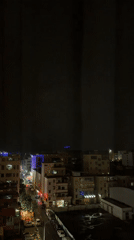 Stormy night aerials and seafood restaurant tanks in Guangzhou